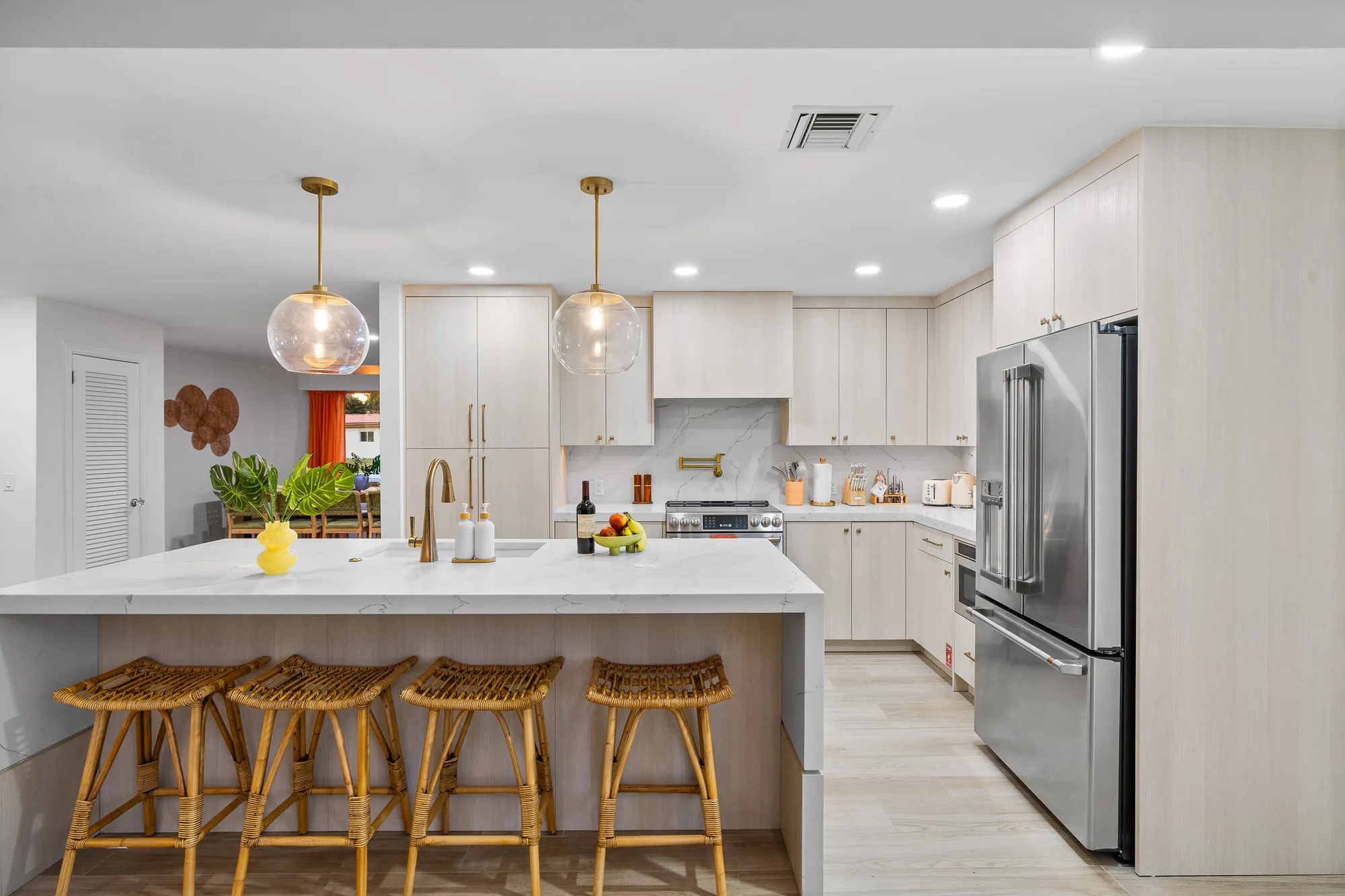 Kitchen with island and bar seating